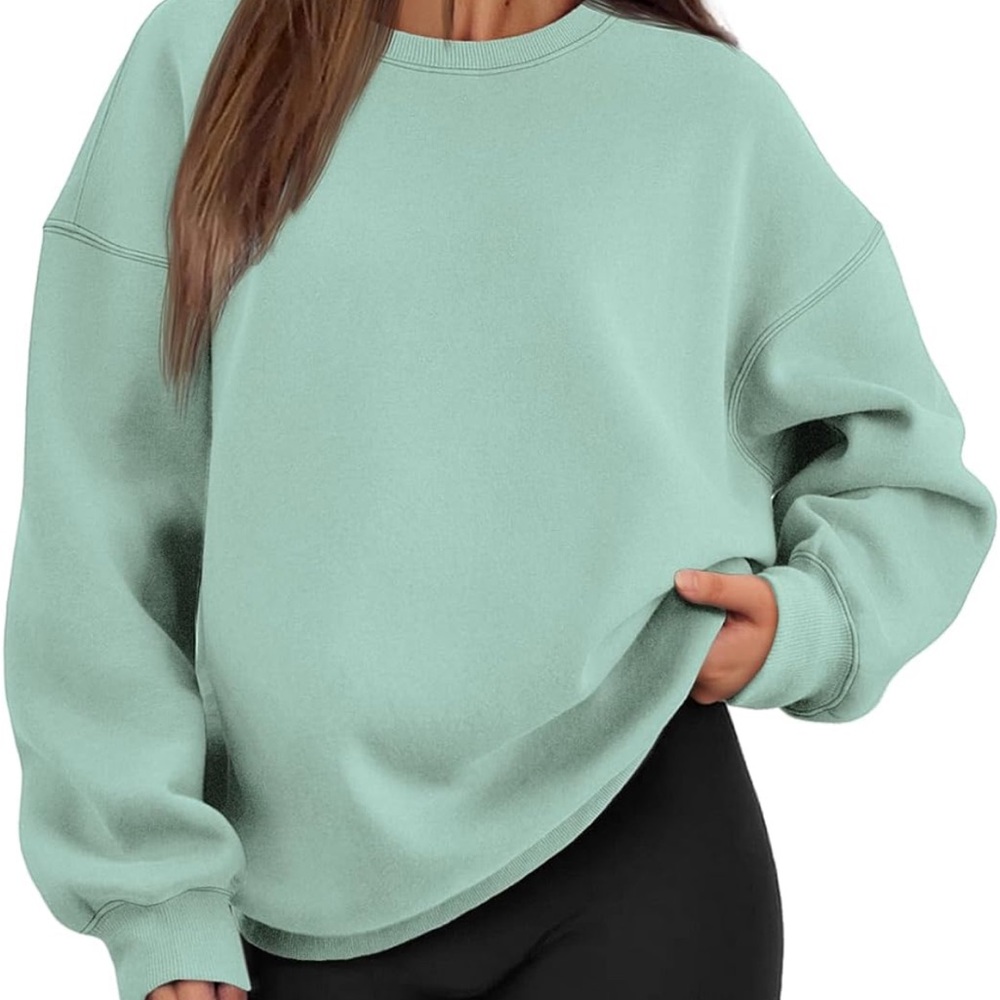 Never worn Amazon Women's Mint Green Sweatshirt. Fuzzy inside Size small